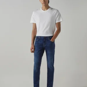 dark blue 5 pocket low rise tapered ankle length classic stretch jeans