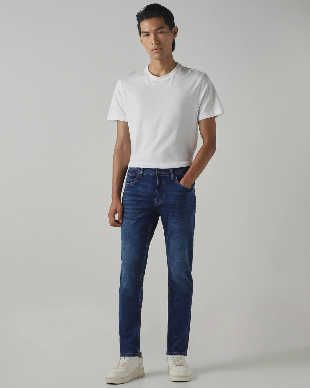 dark blue 5 pocket low rise tapered ankle length stretch jeans dark blue 5 pocket low rise tapered ankle length stretch jeans