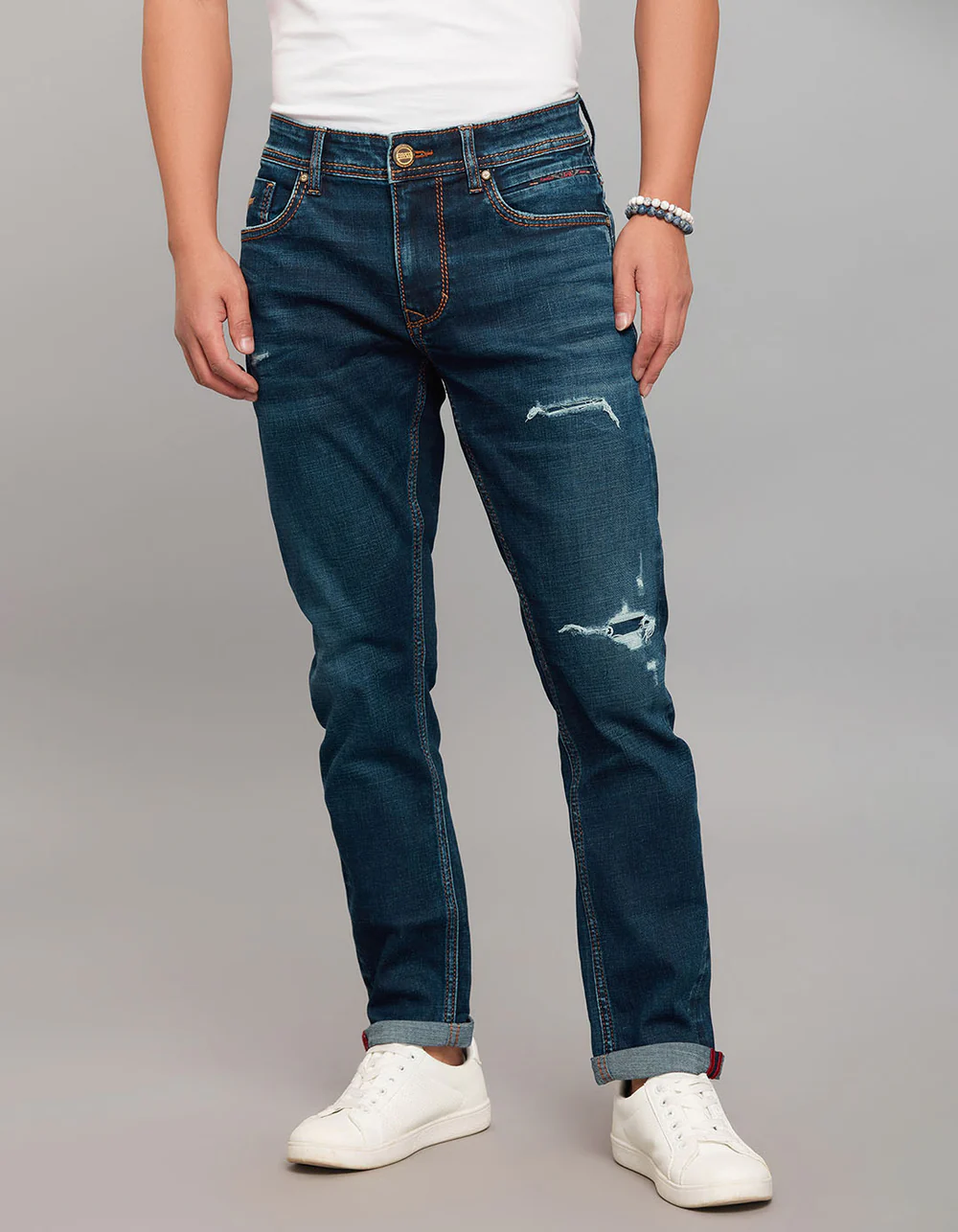 dark blue 5 pocket low rise tapered ankle length stretch jeans dark blue 5 pocket low rise tapered ankle length stretch jeans