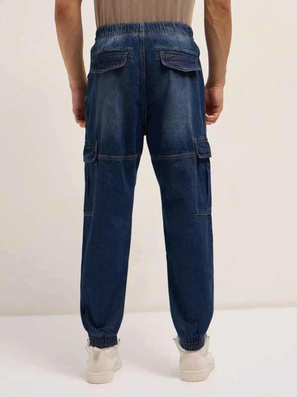 dark blue baggy fit jogger style jean with cargo pockets