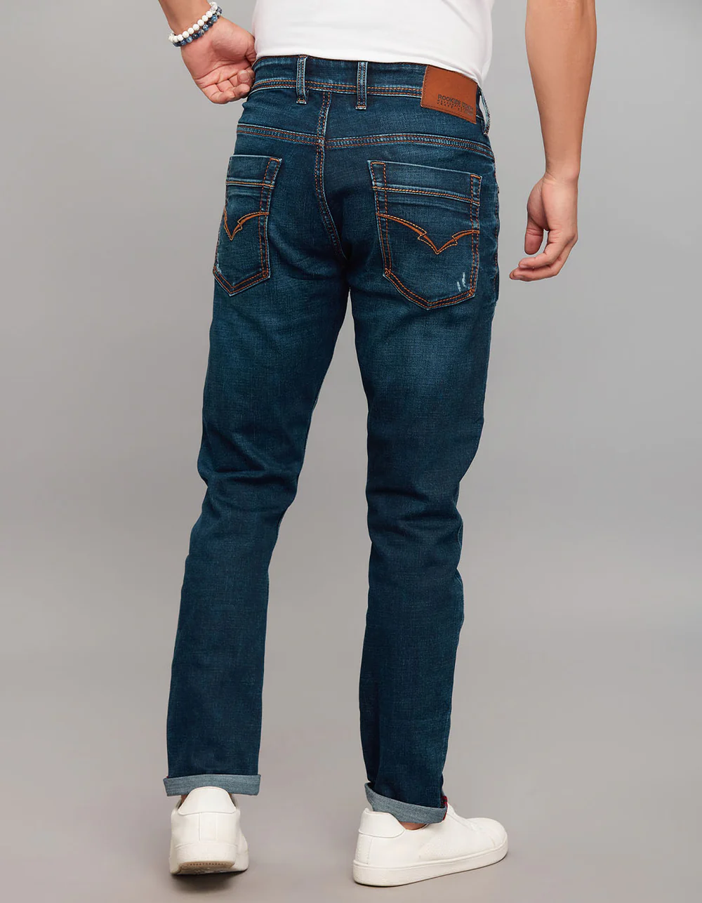 dark blue 5 pocket low rise tapered ankle length stretch jeans dark blue 5 pocket low rise tapered ankle length stretch jeans