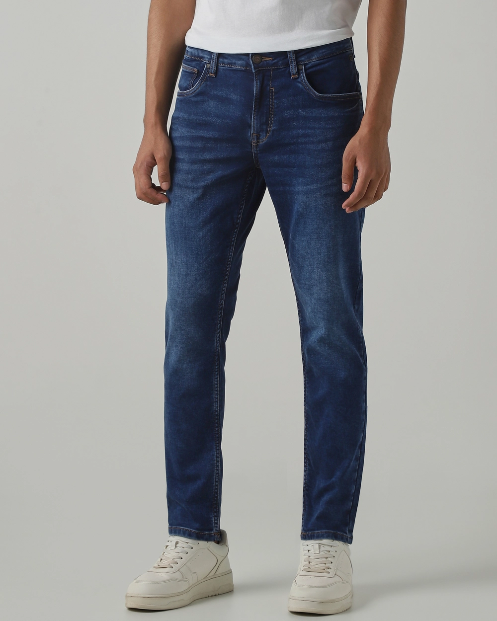 dark blue 5 pocket low rise tapered ankle length stretch jeans dark blue 5 pocket low rise tapered ankle length stretch jeans