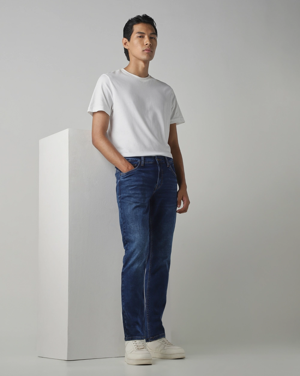 dark blue 5 pocket low rise tapered ankle length stretch jeans dark blue 5 pocket low rise tapered ankle length stretch jeans