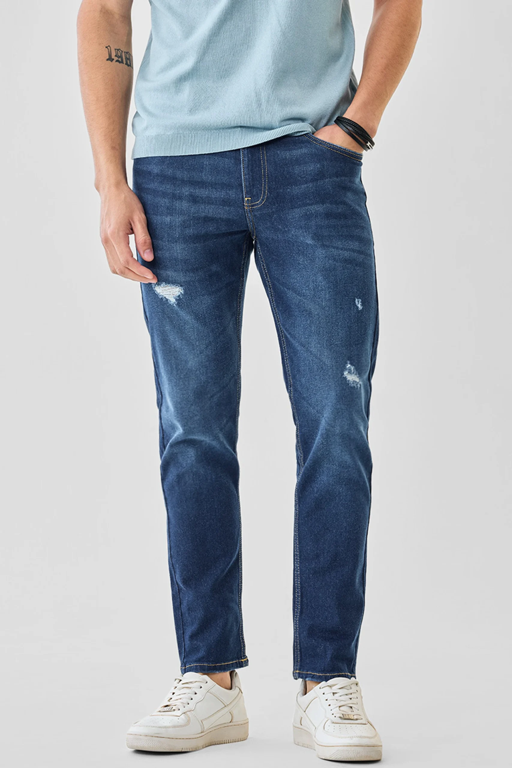dark blue 5 pocket low rise tapered ankle length knit denim jeans dark blue 5 pocket low rise tapered ankle length knit denim jeans