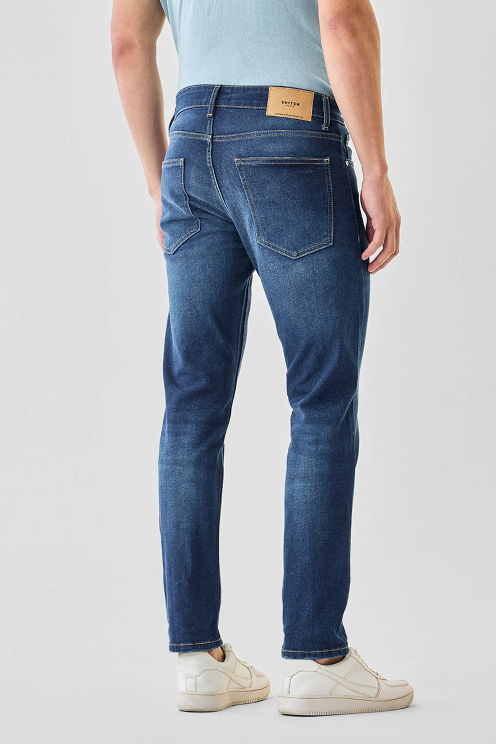dark blue 5 pocket low rise tapered ankle length knit denim jeans dark blue 5 pocket low rise tapered ankle length knit denim jeans