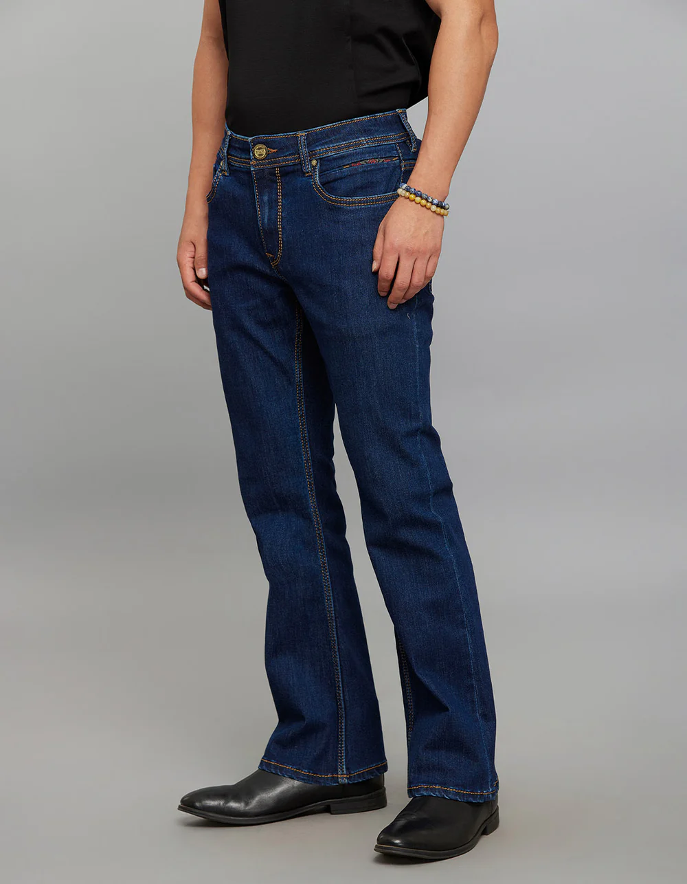 dark blue 5 pocket mid rise cropped length loose boot leg stretch jeans dark blue 5 pocket mid rise cropped length loose boot leg stretch jeans
