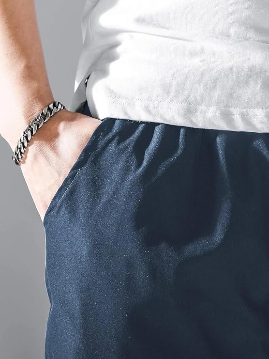 navy blue cotton relaxed fit cargo pants with elastic waist and utility pockets navy blue cotton relaxed fit cargo pants with elastic waist and utility pockets