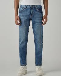 medium blue 5 pocket low rise tapered ankle length stretch jeans medium blue 5 pocket low rise tapered ankle length stretch jeans