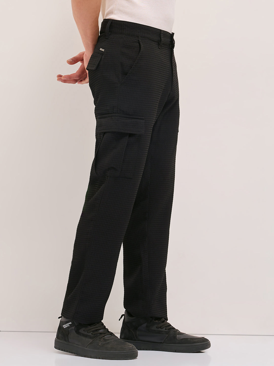 black textured waffle weave straight fit cargo pants with flap pockets black textured waffle weave straight fit cargo pants with flap pockets