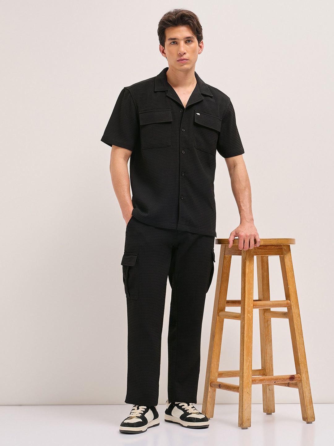 black textured waffle weave straight fit cargo pants with flap pockets black textured waffle weave straight fit cargo pants with flap pockets