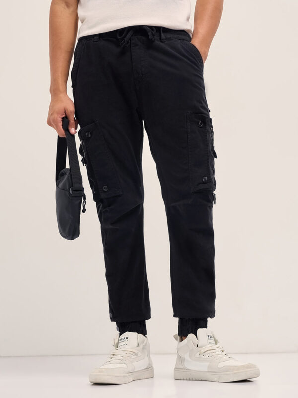 black cotton relaxed fit cargo pants with elastic waist and utility pockets