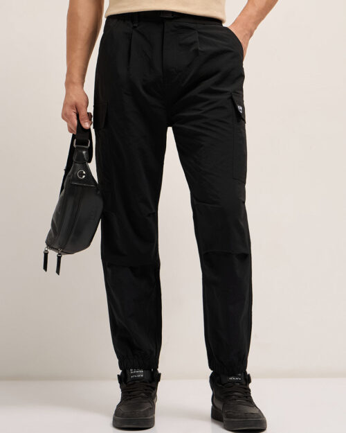 black nylon relaxed fit cargo pants with utility pockets