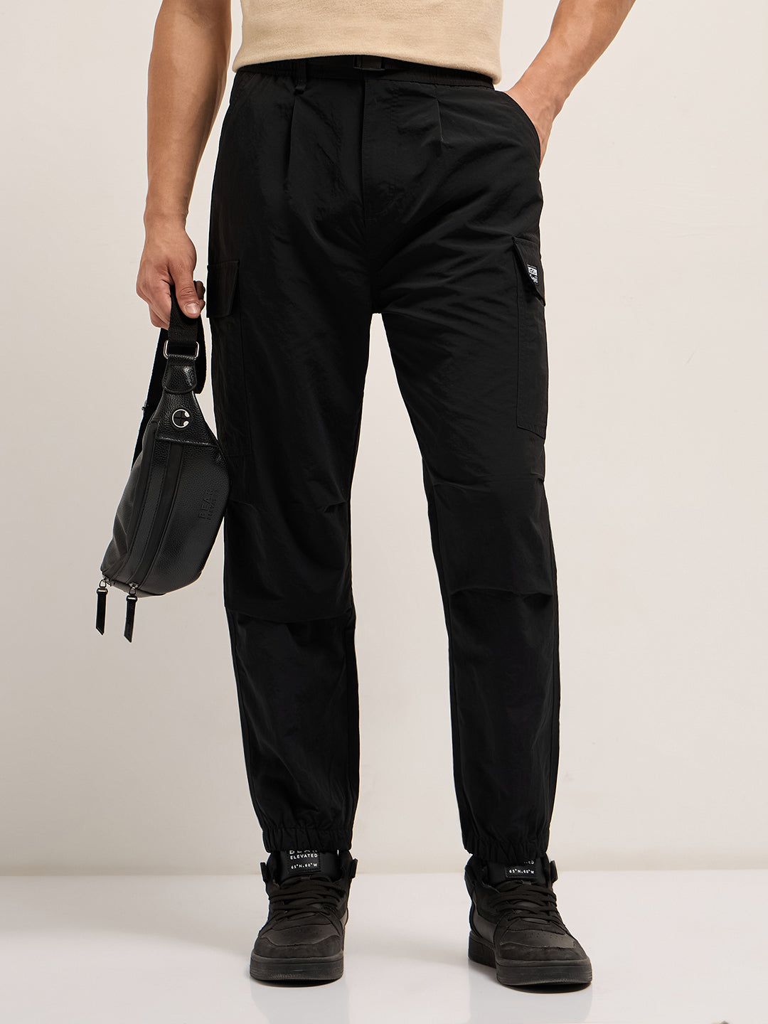 black nylon relaxed fit cargo pants with utility pockets black nylon relaxed fit cargo pants with utility pockets