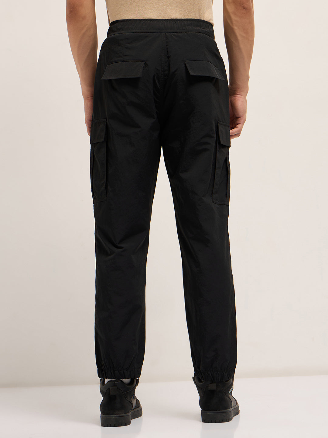 black nylon relaxed fit cargo pants with utility pockets black nylon relaxed fit cargo pants with utility pockets