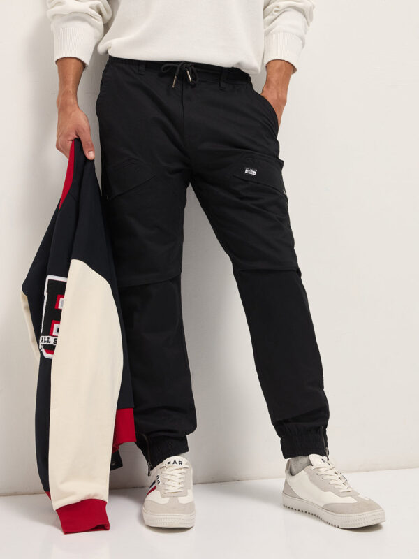 black cotton relaxed fit cargo pants with elastic waist and utility pockets