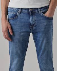medium blue 5 pocket low rise tapered ankle length stretch jeans medium blue 5 pocket low rise tapered ankle length stretch jeans