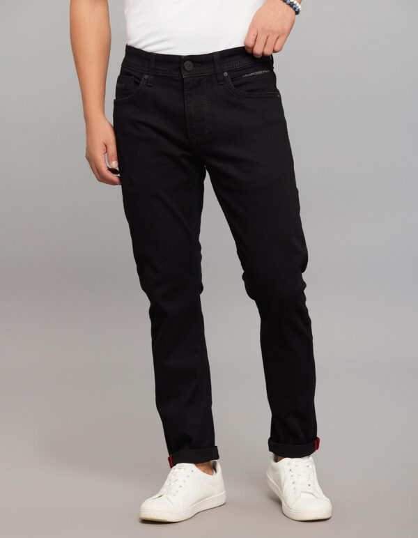 black 5 pocket low rise tapered ankle length stretch jeans